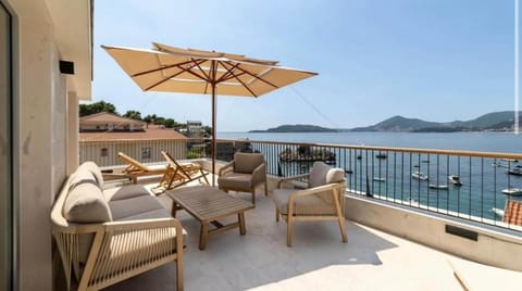 Patio, View (from property/room), Balcony/Terrace, Seating area, Sea view, sunbed