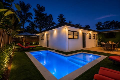 Property building, Patio, Night, Garden, Seating area, Swimming pool