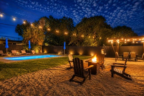 Patio, Night, Garden, Seating area, Dining area, Swimming pool