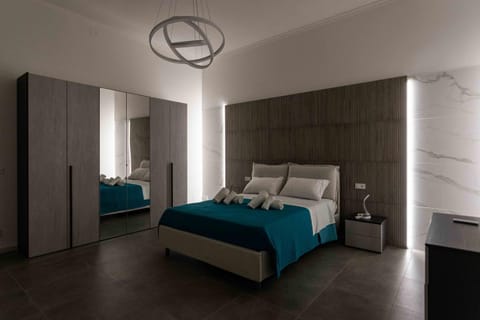 Bed, Photo of the whole room, Bedroom, towels, wardrobe
