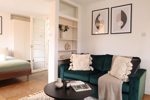 Bed, Living room, Seating area, Bedroom