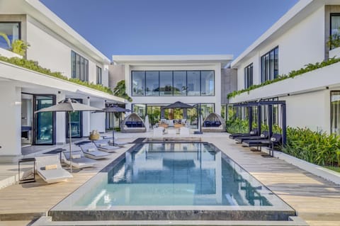 Property building, Patio, Pool view, Swimming pool, sunbed
