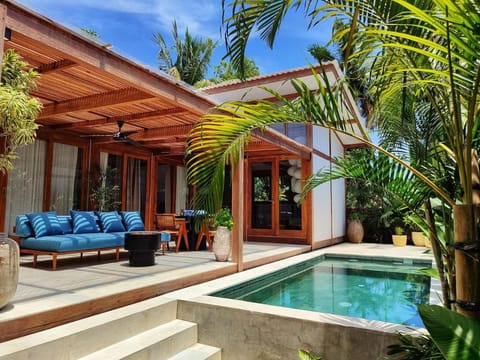 Property building, Garden, Living room, Seating area, Garden view, Pool view, Swimming pool, sunbed