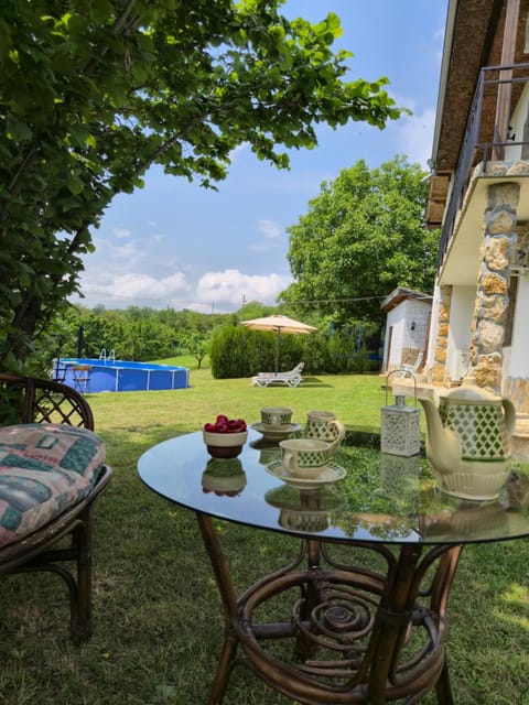 Patio, Day, Natural landscape, Garden, Seating area, Garden view, Pool view, Swimming pool, sunbed