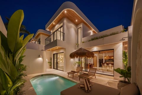 Property building, Patio, Night, Pool view, Swimming pool, sunbed