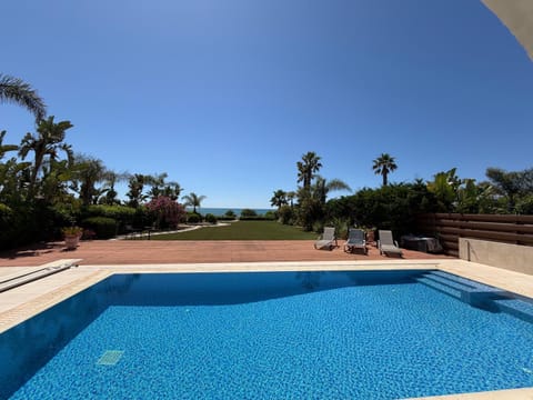 Swimming pool, sunbed