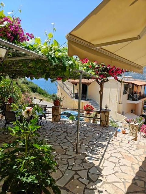 Property building, Patio, Day, Natural landscape, Garden, View (from property/room), Balcony/Terrace, Sea view
