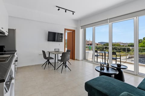 TV and multimedia, Balcony/Terrace, Kitchen or kitchenette, Living room, Seating area, Dining area