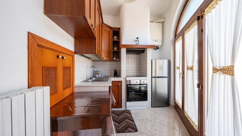 Kitchen or kitchenette, oven, stove