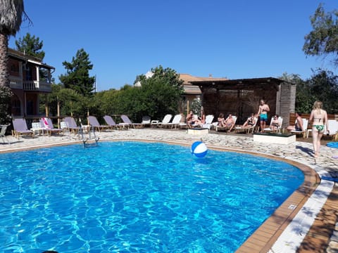 Property building, Living room, Swimming pool
