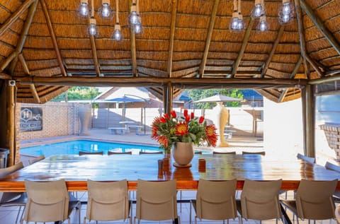 Property building, Patio, Restaurant/places to eat, Day, Dining area, Pool view, Swimming pool, Breakfast