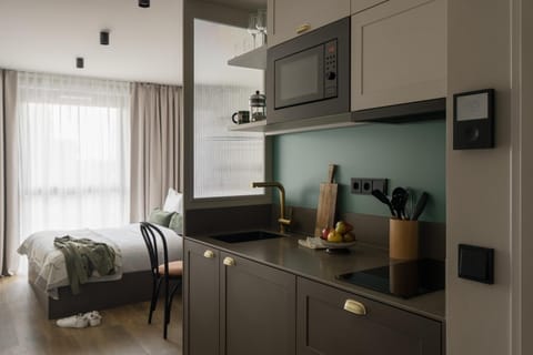 Bed, microwave, stove, kitchen