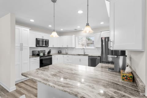 Kitchen or kitchenette, Dining area, dishwasher, oven, stove, toaster