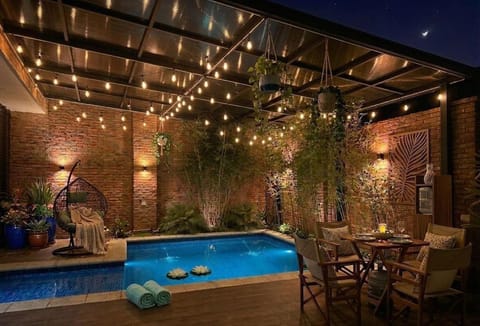 Patio, Night, Natural landscape, Garden, Pool view, Swimming pool, sunbed