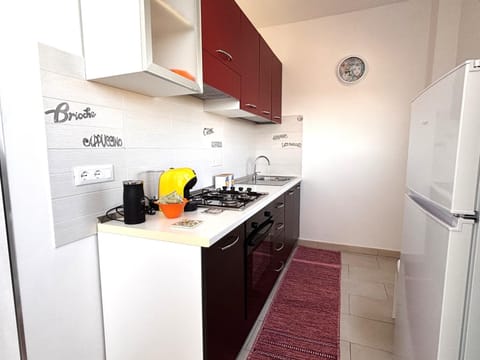 Kitchen or kitchenette, oven, stove