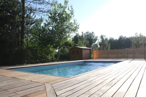 Property building, Living room, Swimming pool