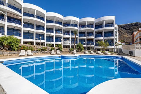 Property building, Living room, Swimming pool