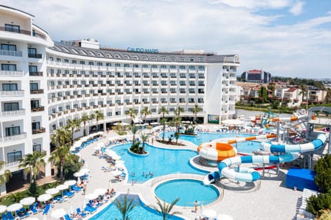 Property building, Off site, Day, People, Activities, Children play ground, Food and drinks, Kids's club, Food, Guests, Pool view, Swimming pool, Sports, Alcoholic drinks, Non alcoholic drinks, Sunset, children, group of guests, Family, sunbed, towels