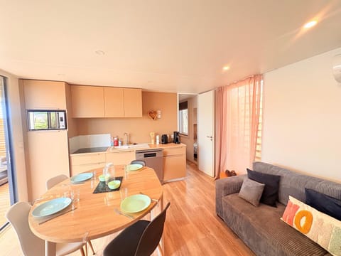 Living room, Dining area, stove, air conditioner