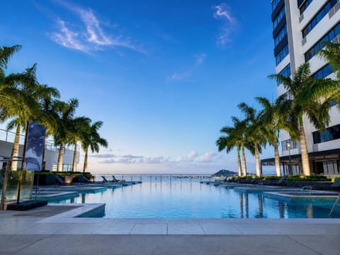 Property building, Day, Natural landscape, Pool view, Swimming pool, sunbed