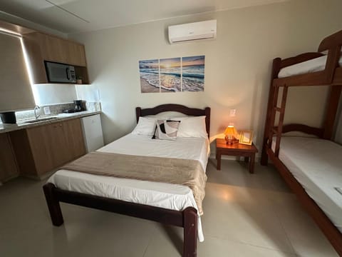 Bed, Kitchen or kitchenette, Photo of the whole room, Bedroom, bunk bed, minibar, oven, air conditioner