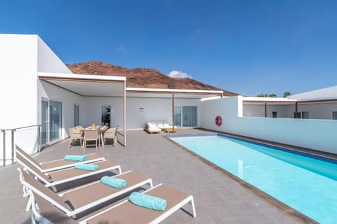 Property building, Living room, Swimming pool