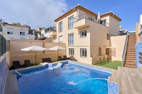 Property building, Living room, Swimming pool