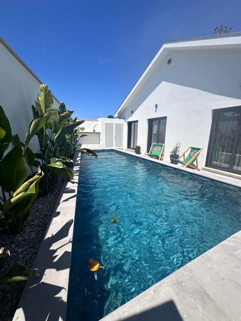 Property building, Pool view, Swimming pool, sunbed
