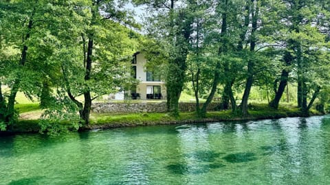 Property building, Day, Natural landscape, Garden, River view