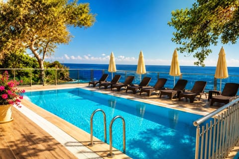 Day, Natural landscape, Pool view, Sea view, Swimming pool, sunbed