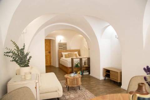 Bed, Living room, Seating area, Bedroom