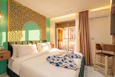 Bed, Photo of the whole room, Bedroom, towels, air conditioner