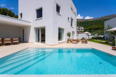 Property building, Pool view, Swimming pool, sunbed