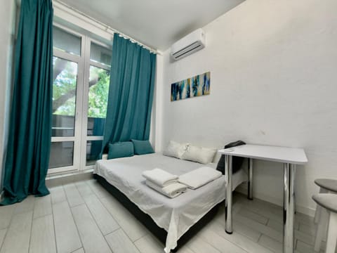 Bed, Photo of the whole room, Bedroom, towels, air conditioner