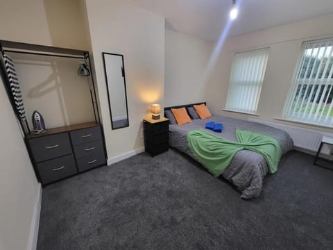 Bed, Bedroom, flat iron, towels, wardrobe