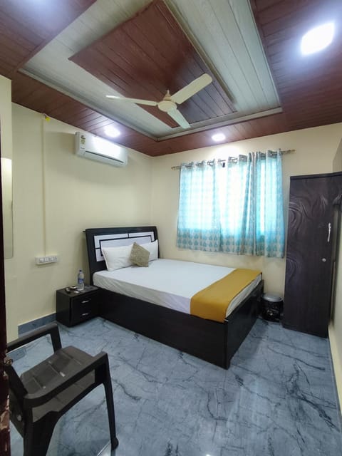Bed, wardrobe, air conditioner