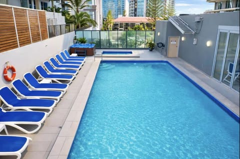 Property building, Day, Pool view, Swimming pool, sunbed