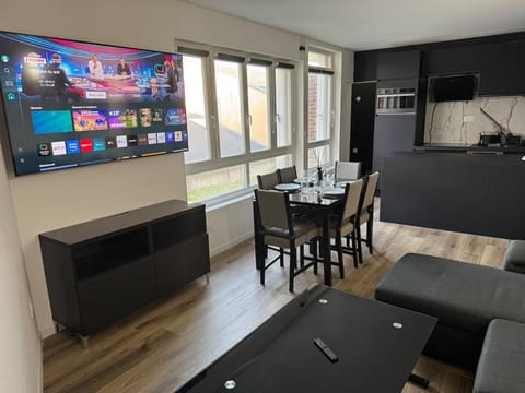 Property building, TV and multimedia, Living room, Seating area, Dining area