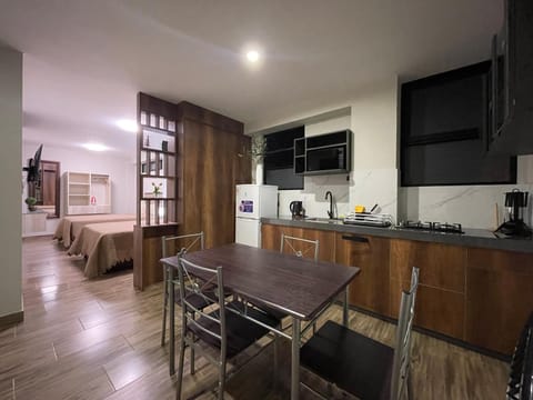 Kitchen or kitchenette, Living room, Seating area, Dining area