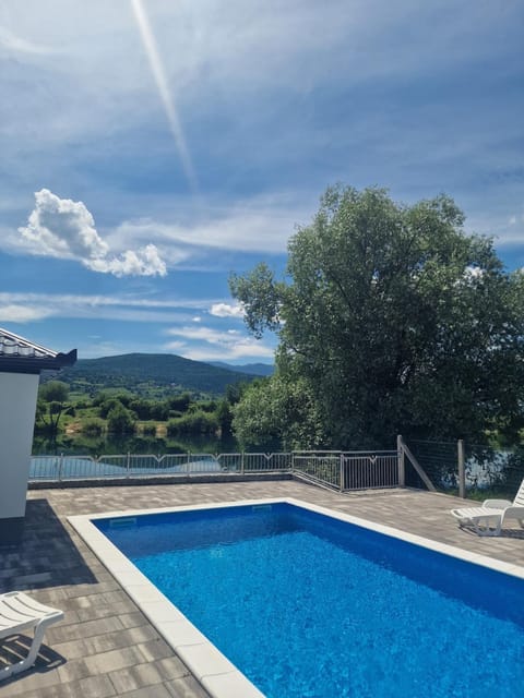 Property building, Patio, Patio, Beach, Beach, Mountain view, Swimming pool, Swimming pool, Swimming pool, Breakfast