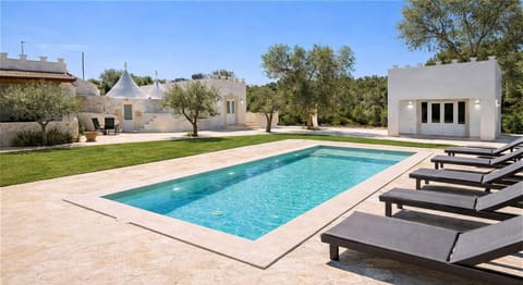 Property building, Patio, Natural landscape, Garden, Garden view, Pool view, Swimming pool, sunbed