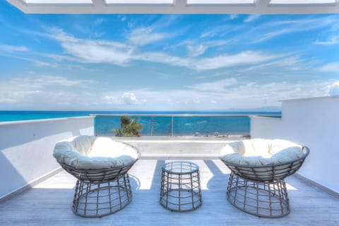 Patio, Day, Natural landscape, View (from property/room), Balcony/Terrace, Living room, Seating area, Dining area, Sea view