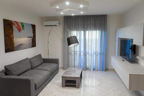 TV and multimedia, Living room, Seating area, air conditioner