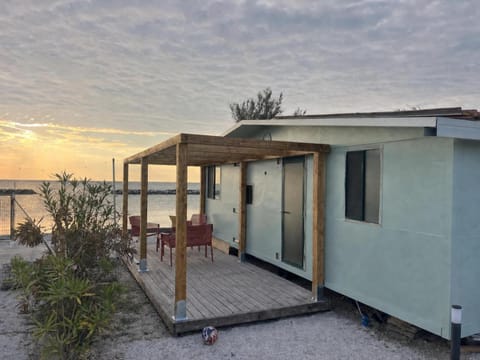 Property building, Patio, Natural landscape, Sea view, Sunrise