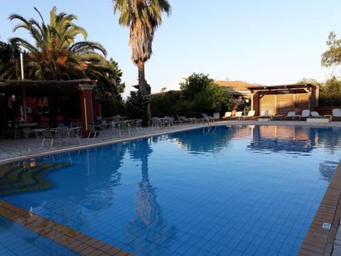 Property building, Living room, Swimming pool