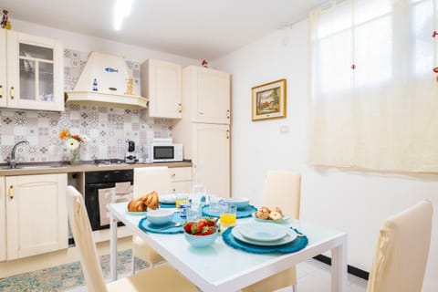 Dining area, microwave, oven, kitchen