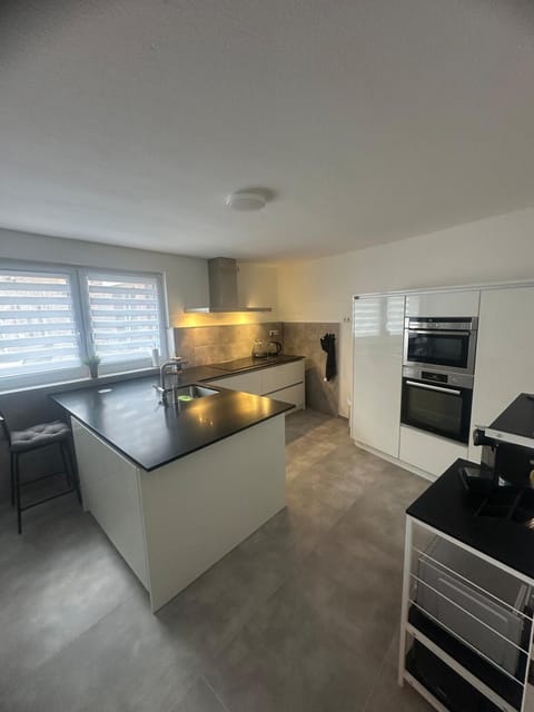 Kitchen or kitchenette, dishwasher, oven, stove, toaster