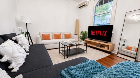 Property building, Communal lounge/ TV room, TV and multimedia, Living room, Seating area, Evening entertainment