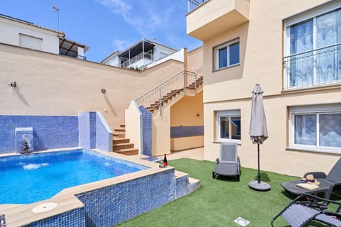Property building, Living room, Swimming pool