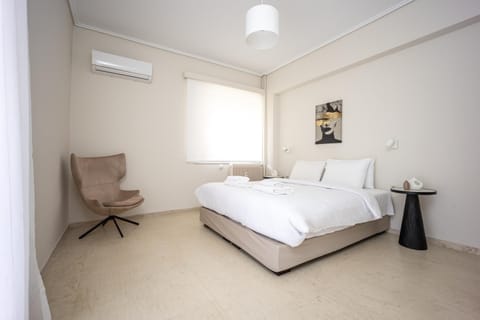 Bed, Photo of the whole room, Bedroom, towels, air conditioner